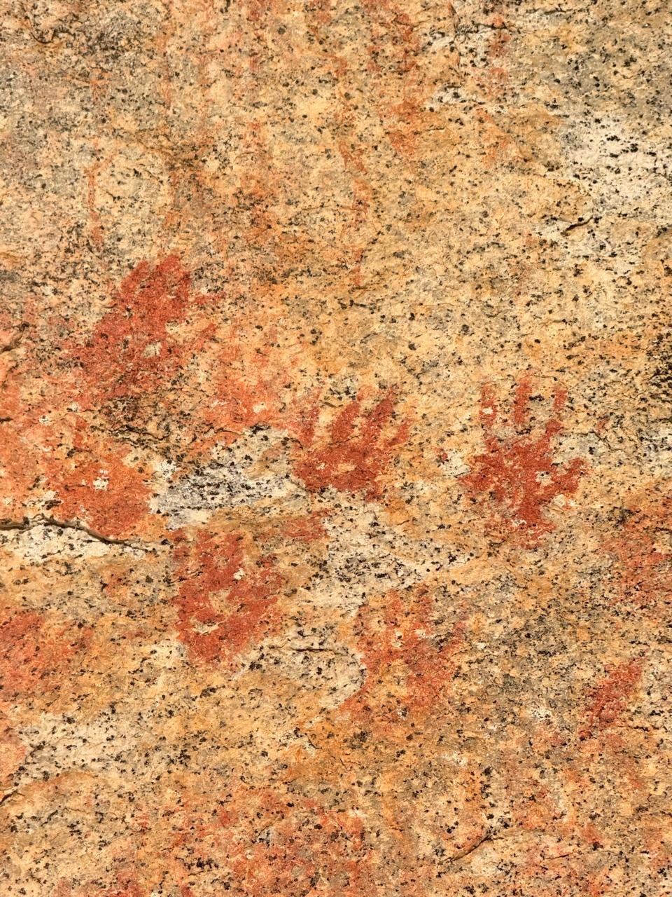 Pericú hand paintings, left on the rock centuries ago