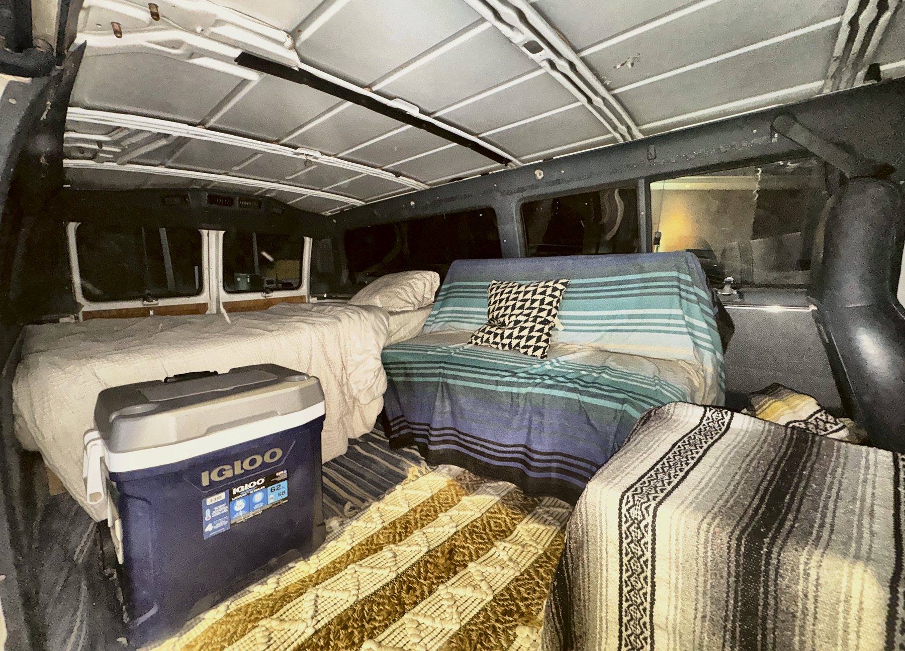 Bed, couch and the Igloo cooler
